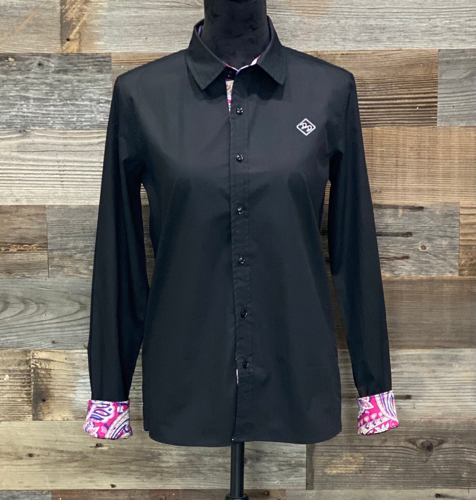 Youth show shirt. Lightweight, breathable fabric with a solid black color. Shirt offers a multi-colored paisley print cuff and placket. Made of 100% cotton.